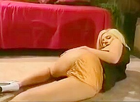Blonde teases in orange satin panties