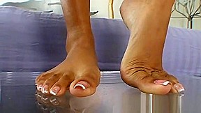 Carmen Rivera soles on glass