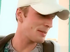 Gay public blowjob with a city view