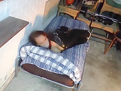 Girl In A Catsuit Hogtied In The Basement