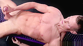 Handsome muscle stud strokes his huge cock
