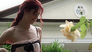 This redhead enjoys outdoor sex today