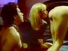 Two sluts and guy in BDSM trio