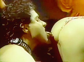 Two sluts and guy in BDSM trio