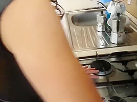 Wife Masturbates On The Counter In Rubber Gloves